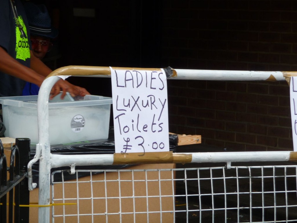 Paying to use a private toilet at the Notting Hill Carnival